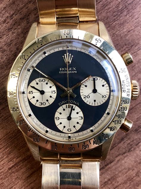 rolex daytona john player special.